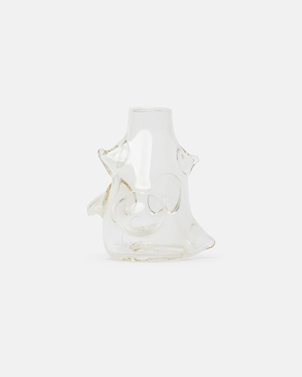 Clear glass vase with star design on a white background