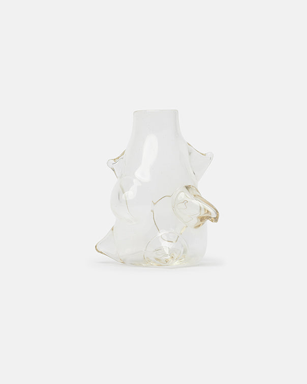 Clear glass vase with gold accents on a white background