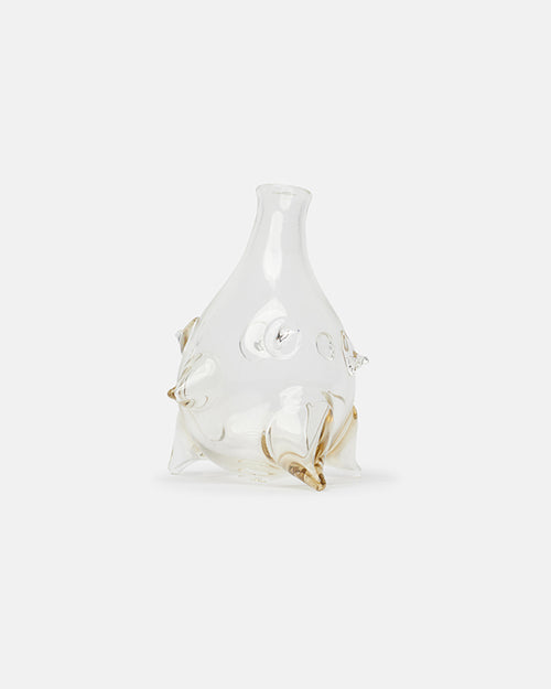 Clear glass vase with gold accents on a white background