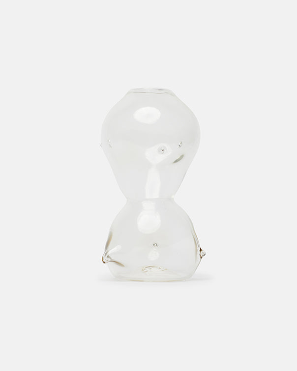 Clear glass hourglass on a white background