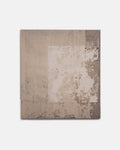 Rectangular area rug with a textured pattern on a plain background