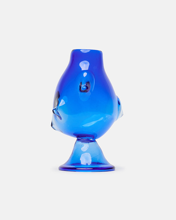 Blue glass object on a white background