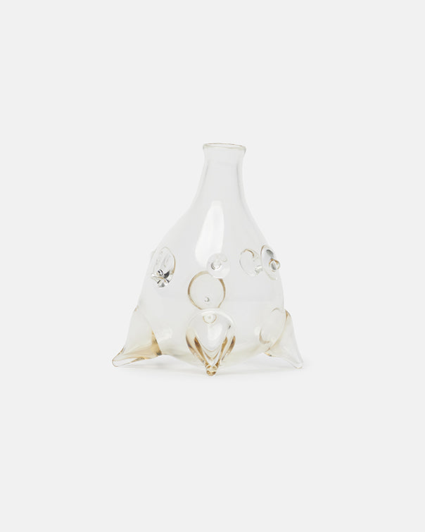 Decorative glass vase with gold accents on a white background