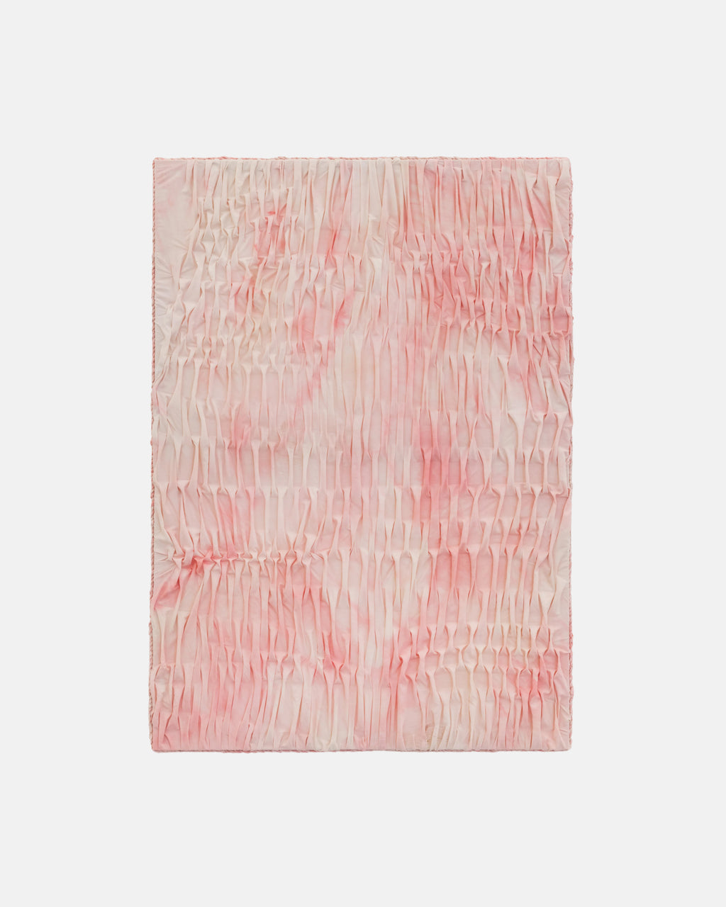 Pink and white textured fabric on a light gray background