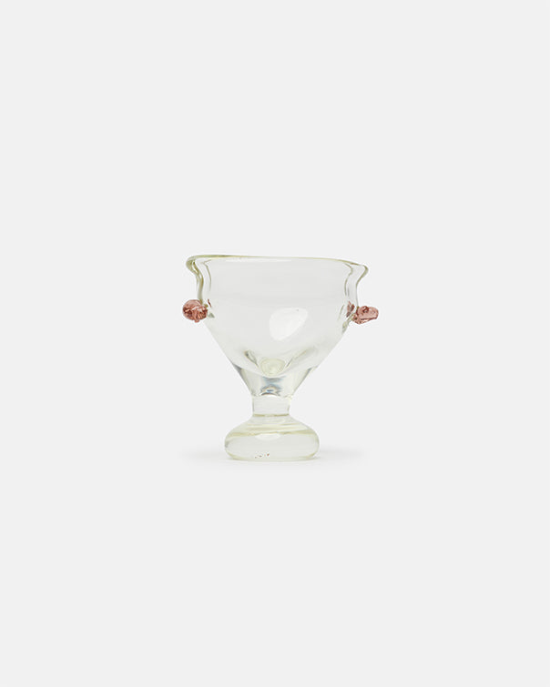 Clear glass vase with pink accents on a white background