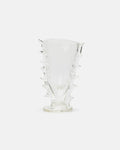 Clear glass vase with textured design on a white background