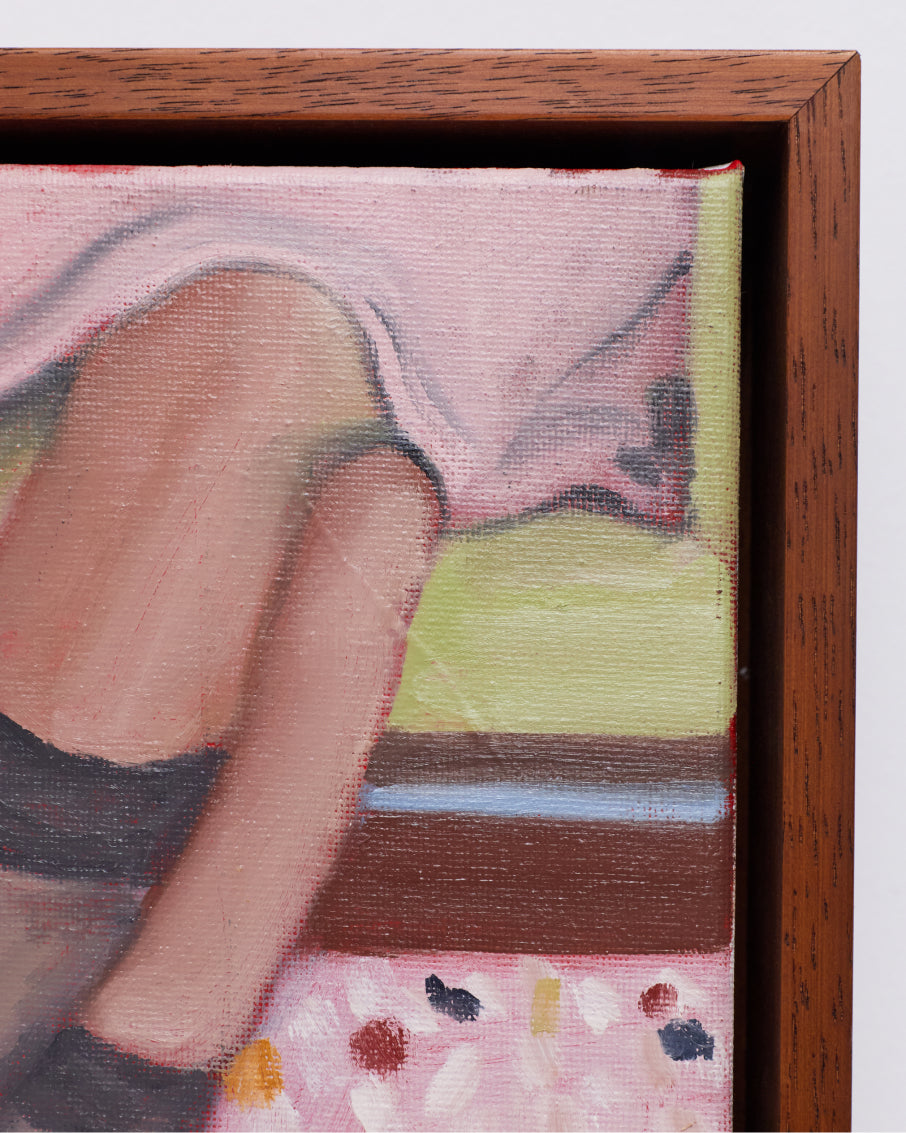 Close-up of a textured fabric with a wooden frame