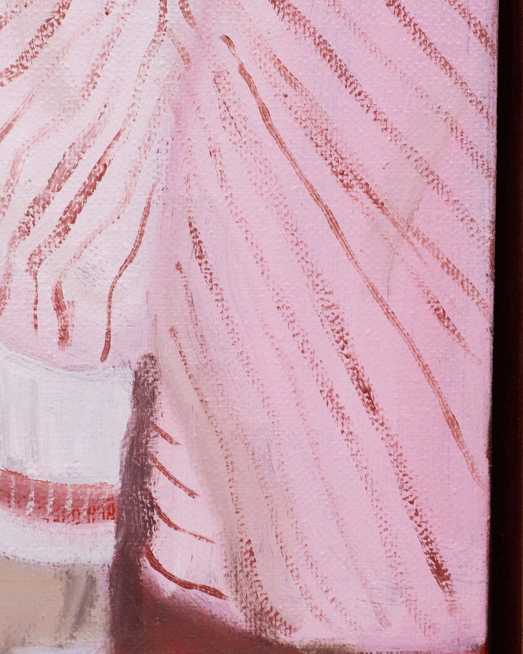Close-up of a textured pink fabric with red lines