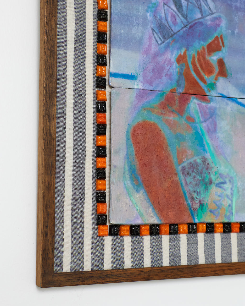 Abstract artwork with a wooden frame featuring geometric patterns.